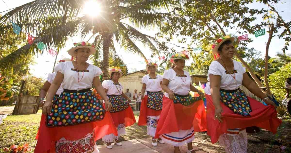 Local Women In Traditional Dress In Belize