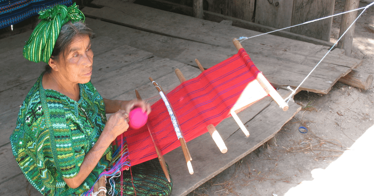 Local Woman Weaving In Guatemala