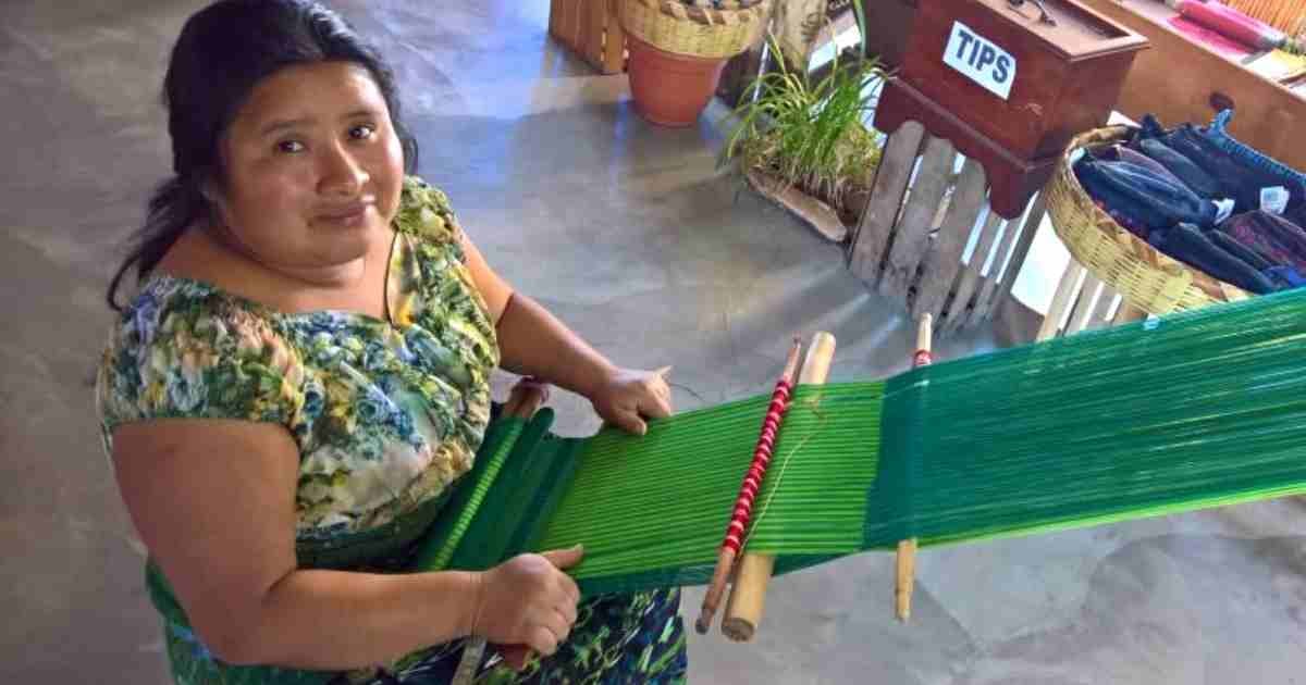 A Local Woman Weaving In Guatemala