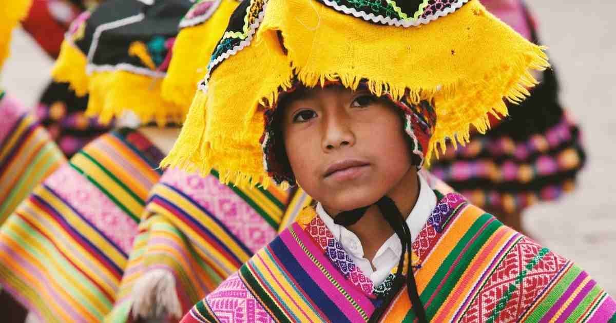 How To Be A Responsible Traveller 6 Peruvian boy wearing traditional dress