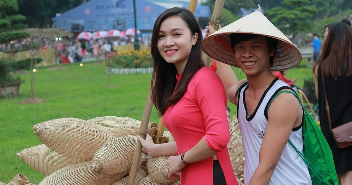 Top 10 Items to Take on a Long Haul Trip 4 Two Vietnamese people smiling