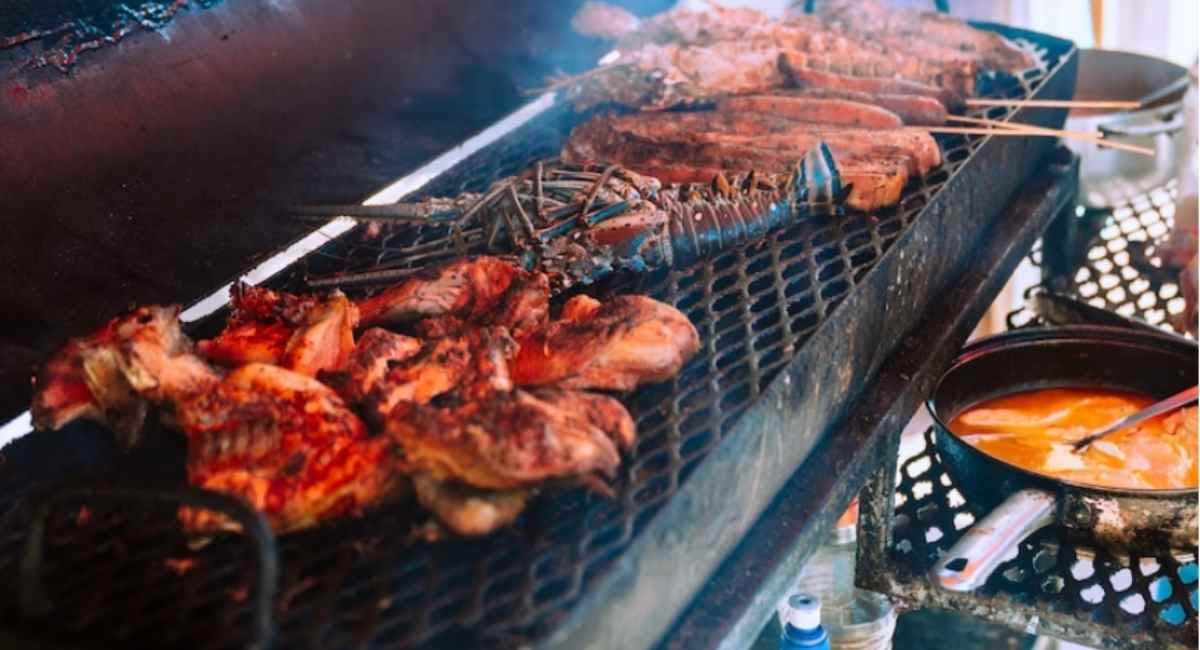 Top Foodie Destinations To Visit 2 spiny lobster on the BBQ grill in Belize