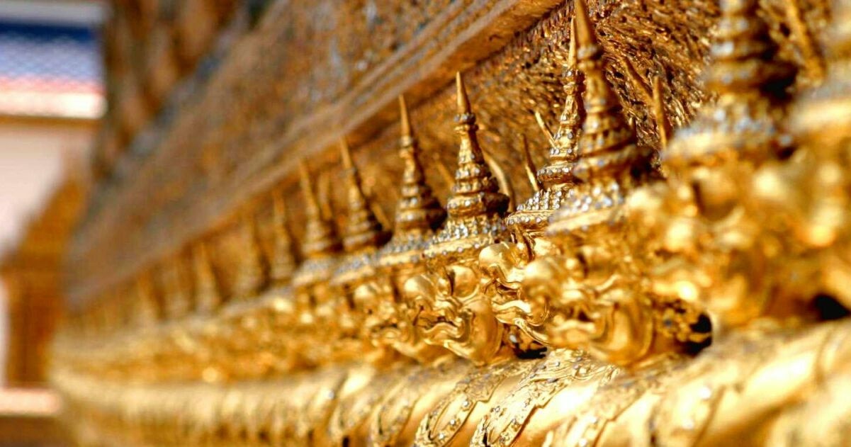 Bangkok City Guide 4 Gold statues in a line